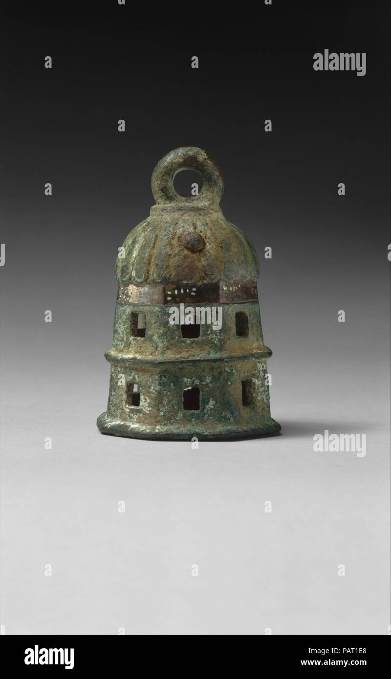 Bell inscribed with the Urartian royal name Argishti. Culture: Urartian. Dimensions: 3.43 in. (8.71 cm). Date: ca. 789-766 B.C..  This classical Urartian bell has a domed top, an octagonal and perforated body with a central raised ridge, and a loop for suspension. The Urartian cuneiform inscription reads: 'From the arsenal of [King] Argishti.'. Museum: Metropolitan Museum of Art, New York, USA. Stock Photo