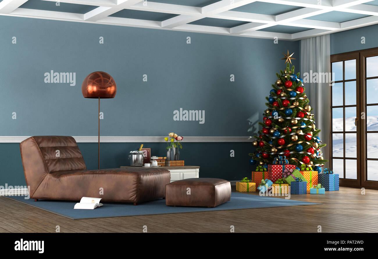Living room of a mountain house with Christmas tree and leather chaise