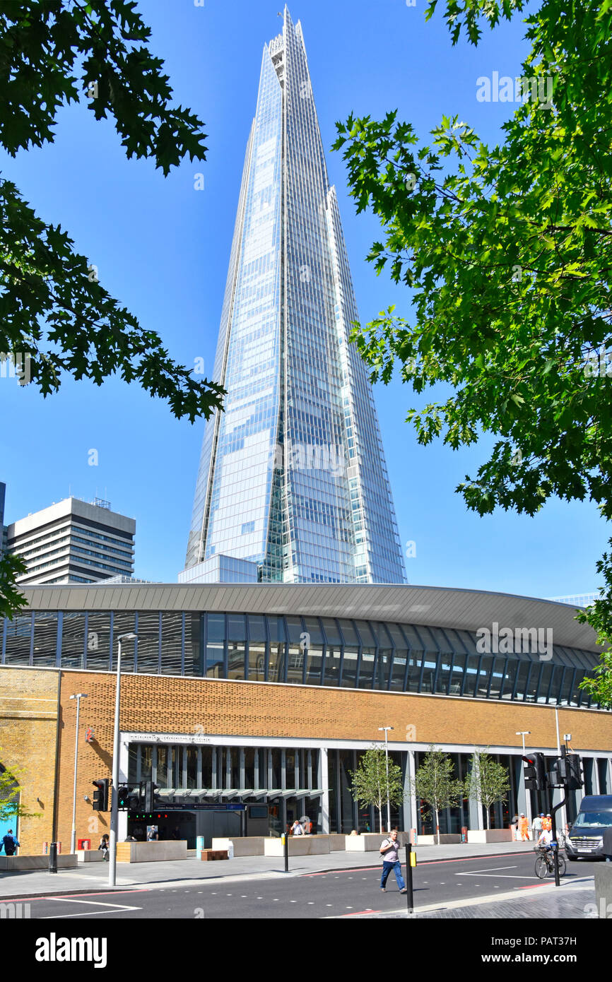 New Tooley Street modern exterior & entrance to London Bridge train station The Shard landmark skyscraper building Southwark South London England UK Stock Photo