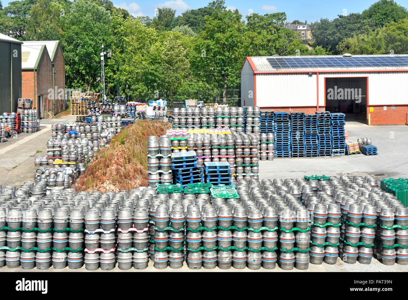 Timothy Taylors Beers small brewery business & yard for beer barrel keg & pallet storage with warehouse buildings Keighley West Yorkshire England UK Stock Photo