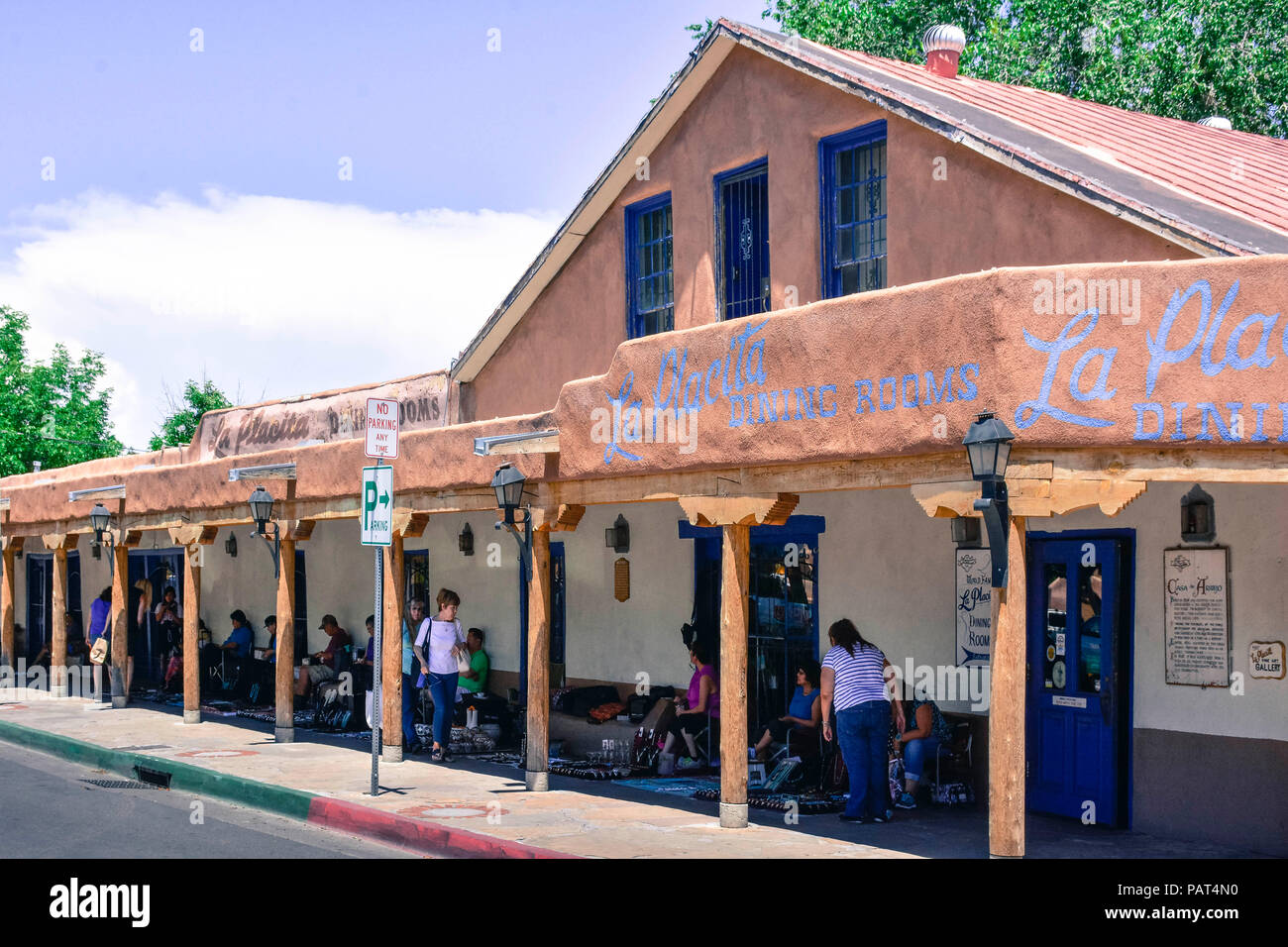 View of the native Americans selling their wares under the portico of the La Placita restaurant in old town Albuquerque, NM Stock Photo