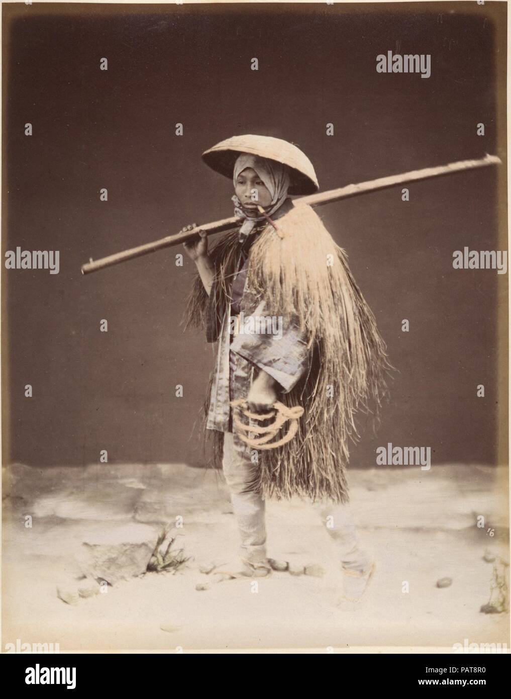Farm laborer with rain coat (mino). Artist: Suzuki Shin'ichi (Japanese, 1835-1919). Dimensions: 25.2 x 19.7 cm (9 15/16 x 7 3/4 in.). Date: 1870s. Museum: Metropolitan Museum of Art, New York, USA. Stock Photo