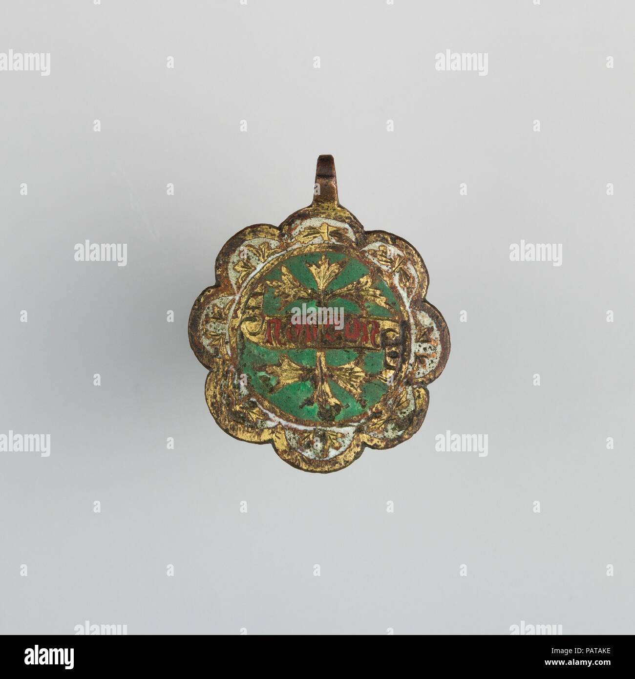 Badge (probably from Horse Harness). Culture: Spanish. Dimensions: H. 2 3/8 in. (6 cm); W. 2 in. (5.1 cm); Wt. 0.5 oz. (14.2 g). Date: 14th century. Museum: Metropolitan Museum of Art, New York, USA. Stock Photo