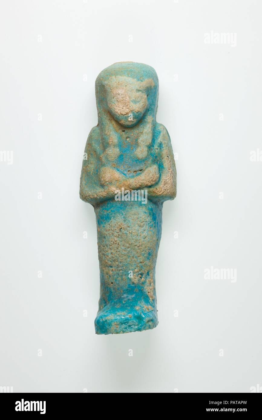 Worker Shabti of Henettawy (C), Daughter of Isetemkheb. Dimensions: h. 12.2 × w. 4.5 × d. 3.4 cm (4 13/16 × 1 3/4 × 1 5/16 in.). Dynasty: Dynasty 21. Date: ca. 990-970 B.C.. Museum: Metropolitan Museum of Art, New York, USA. Stock Photo