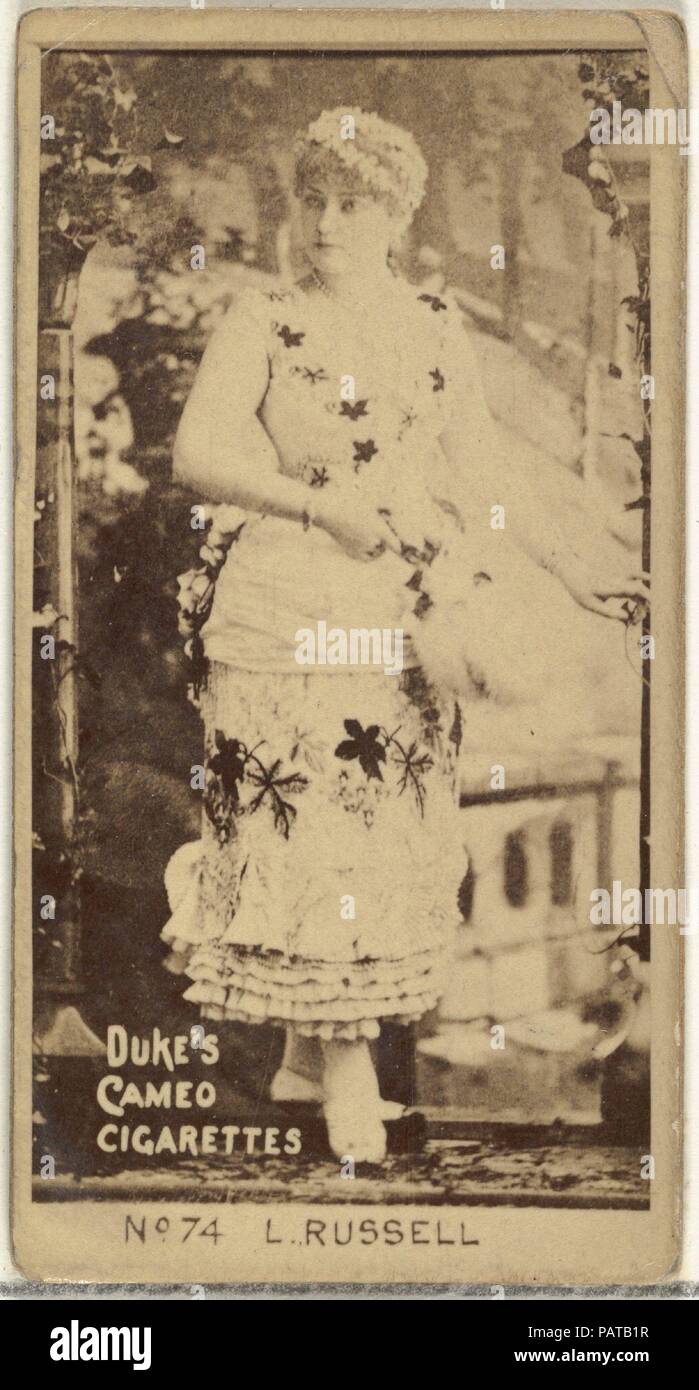 Card Number 74, Lillian Russell, from the Actors and Actresses series (N145-4) issued by Duke Sons & Co. to promote Cameo Cigarettes. Dimensions: Sheet: 2 11/16 × 1 3/8 in. (6.8 × 3.5 cm). Publisher: Issued by W. Duke, Sons & Co. (New York and Durham, N.C.). Date: 1880s.  Trade cards from the set 'Actors and Actresses' (N145-4), issued in the 1880s by W. Duke Sons & Co. to promote Cameo Cigarettes. There are eight subsets of the N145 series. Various subsets sport different card designs and also promote different tobacco brands represented by W. Duke Sons & Company. This card is from the fourth Stock Photo