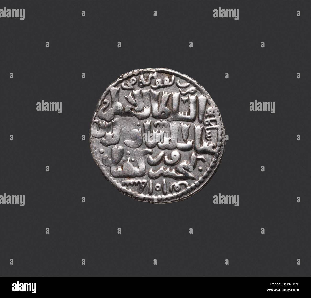 Dirham of Ghiyath al-Din Kai Khusrau II (r. 1239-46); Astrological Device (Sun-Lion). Dimensions: Diam. 7/8 in. (2.2 cm)  D. 1/16 in. (0.2 cm)  Wt. 0.1 oz. (2.8 g). Date: dated A.H. 638/ A.D. 1240-41.  Gold and silver coins were considered high-value money, used and traded over long distances. It was the principal form of currency used by high-ranking officials to pay land tax or iqta' (revenue from grants of land). In Rum Seljuq lands very fine dirhams and a few gold coins were minted. They are exceptional in Islamic coinage for the presence of figural imagery. The two main themes are the ast Stock Photo