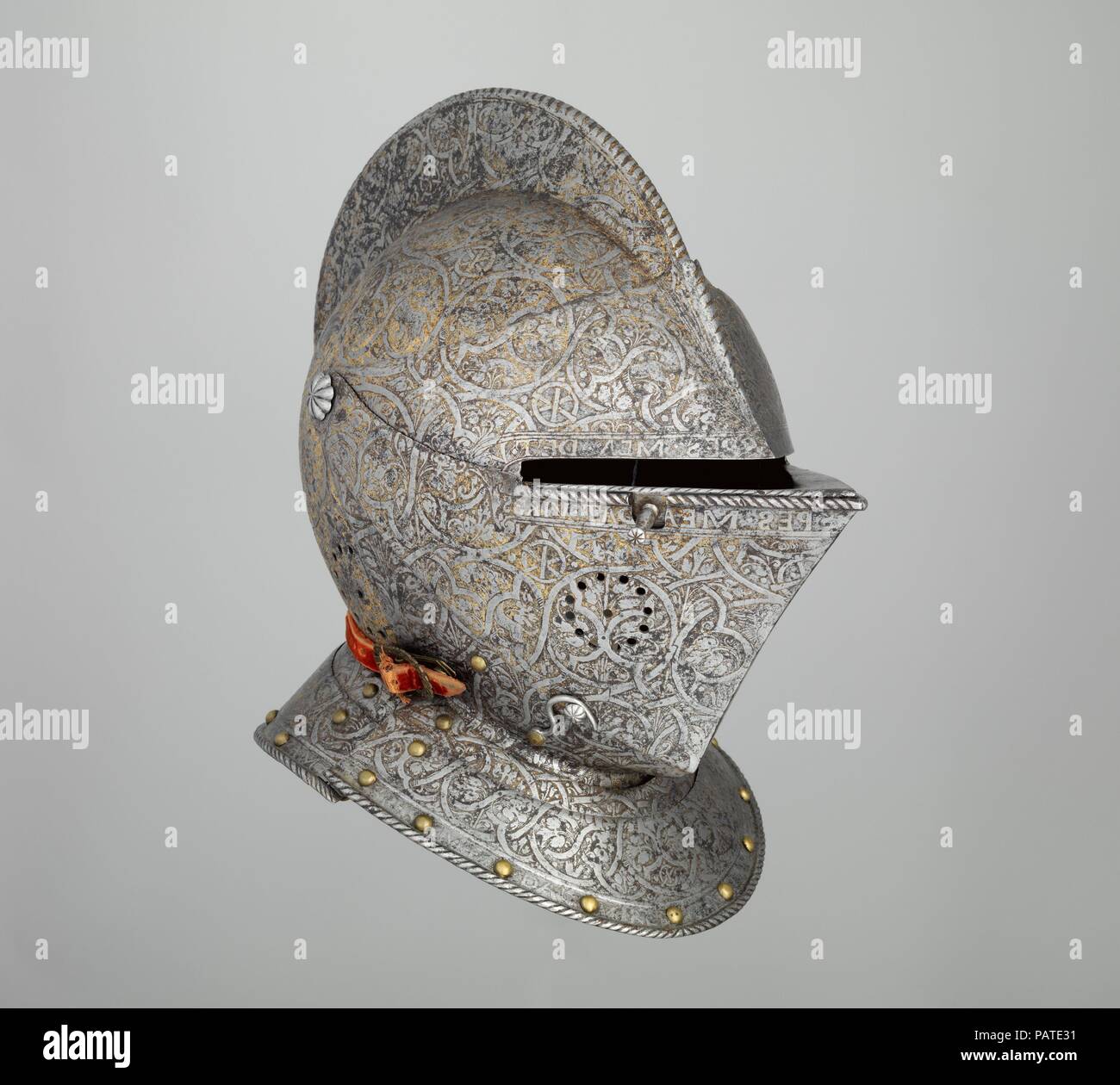 Close Helmet of Claude Gouffier (1501-1570). Culture: French. Dimensions: H. 15 3/4 in. (40 cm); W. 8 1/4 in. (21 cm); D. 14 1/2 in. (36.8 cm); Wt. 6 lb. 5 oz. (2863 g). Date: ca. 1555-60.  This is an excellent example of a French heavy cavalry helmet of the mid-sixteenth century. Its elaborate decoration includes the monogram of Claude Gouffier (1501-1570), Master of the Horse (Grand Écuyer) for Henry II and Charles IX. This monogram is also on a knee piece from the armor of Gouffier's in the Metropolitan Museum's collection (acc. no. 1994.390). Museum: Metropolitan Museum of Art, New York, U Stock Photo