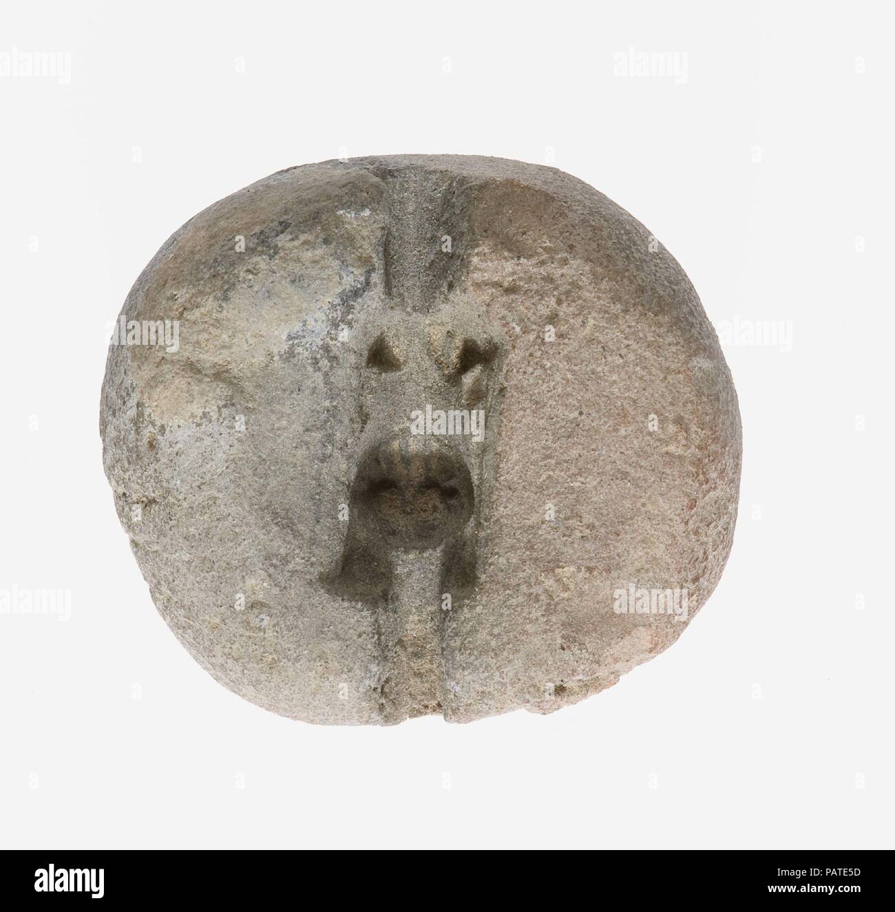 Mold for a Lion Amulet. Dimensions: L. 1.7 cm (11/16 in); w. 1.5 cm (9/16 in). Dynasty: Dynasty 18. Reign: reign of Amenhotep III. Date: ca. 1390-1353 B.C.. Museum: Metropolitan Museum of Art, New York, USA. Stock Photo
