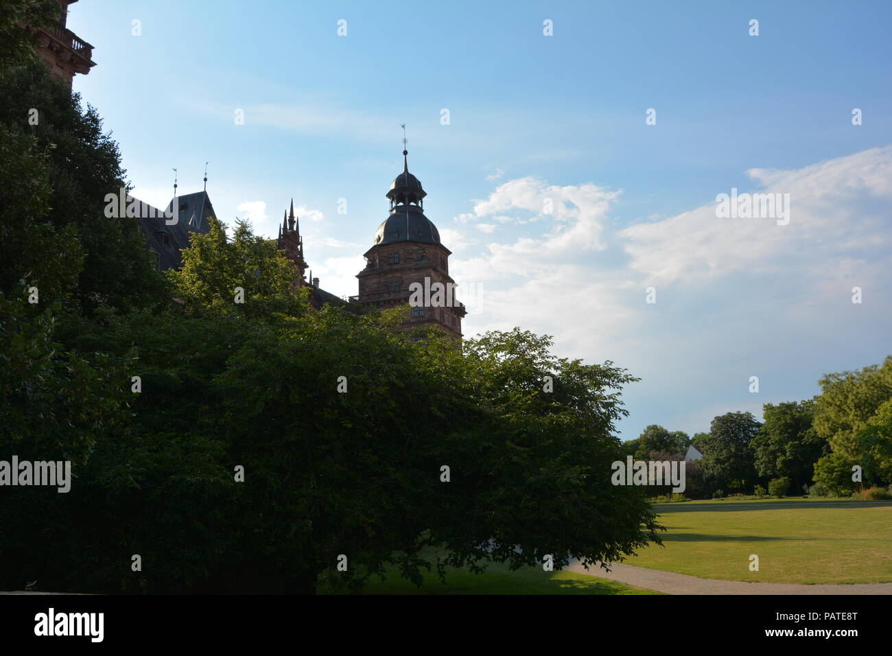 Johannisburg Castle in Aschaffenburg , Germany, Bavaria with blue sky and tree Stock Photo