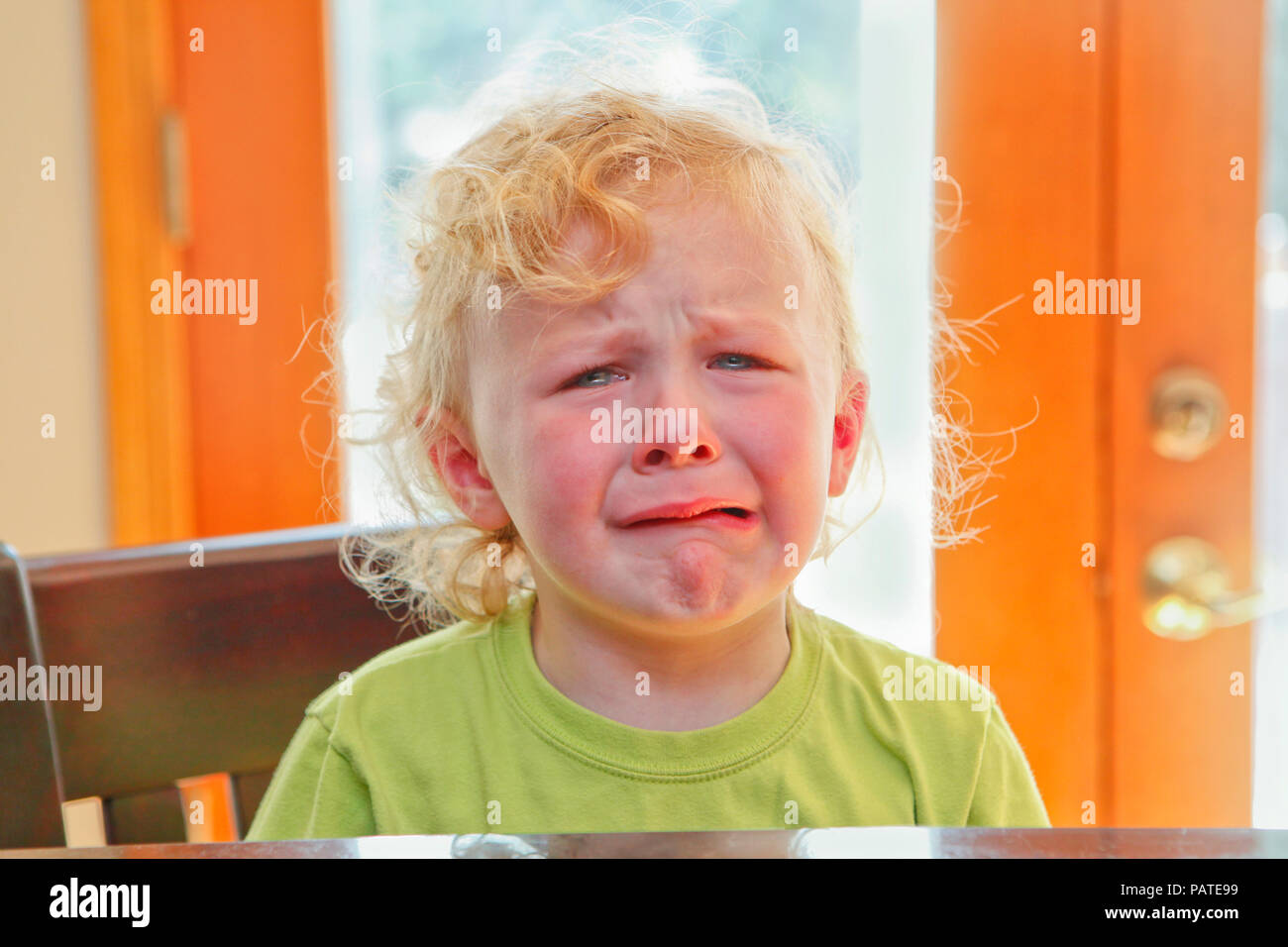 Very sad, crying child Stock Photo