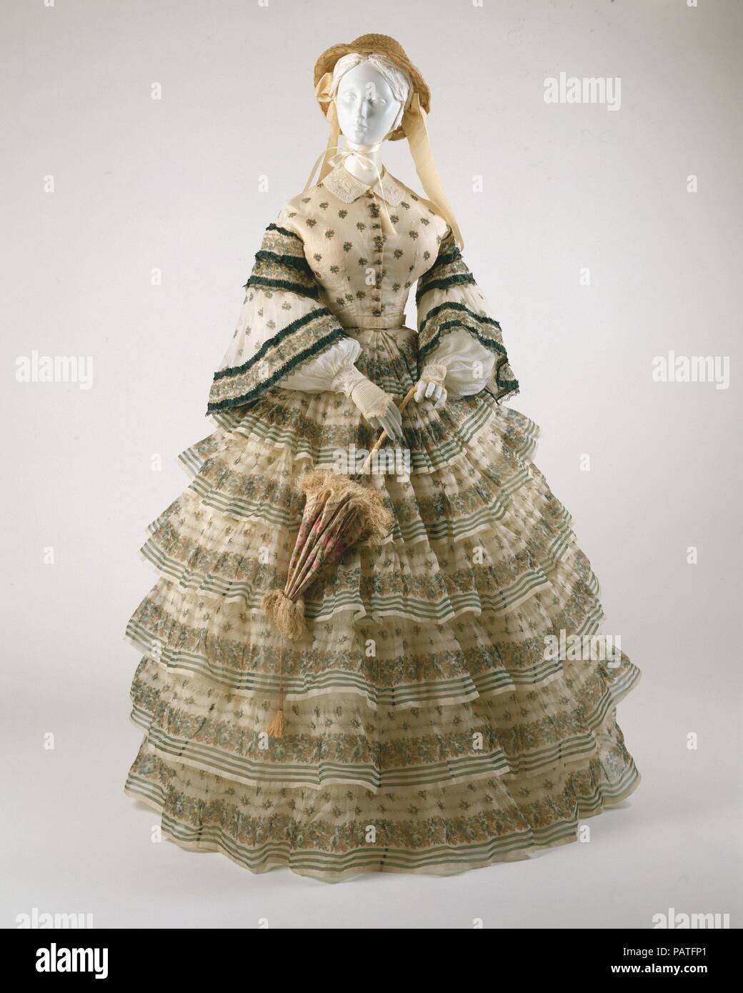 Ensemble. Culture: American or European. Date: ca. 1855. Equipped with two  interchangeable bodices, this outfit might seem to anticipate career  dressing or even women becoming sensible about fashion. Not in the realm