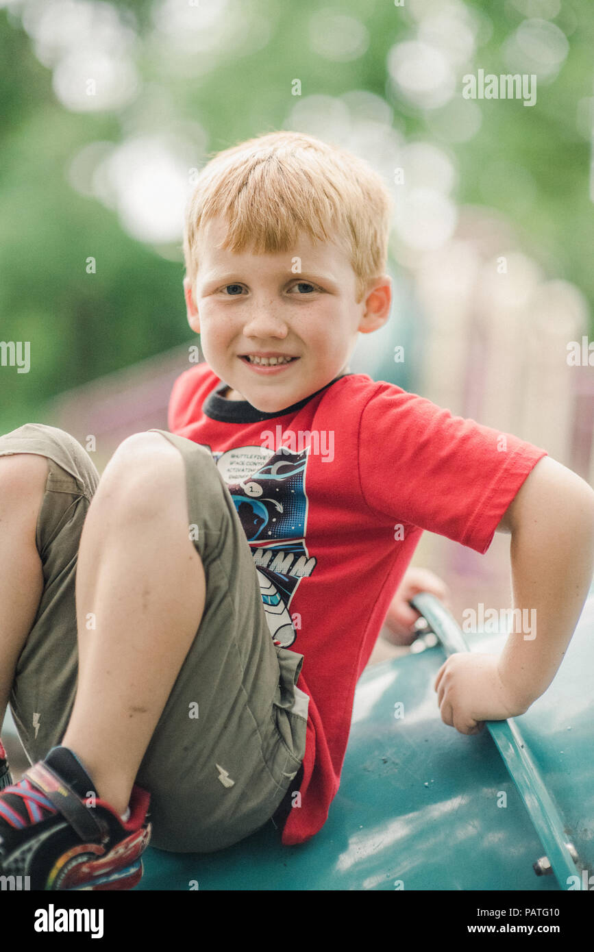 Three year old boy on the playground Stock Photo