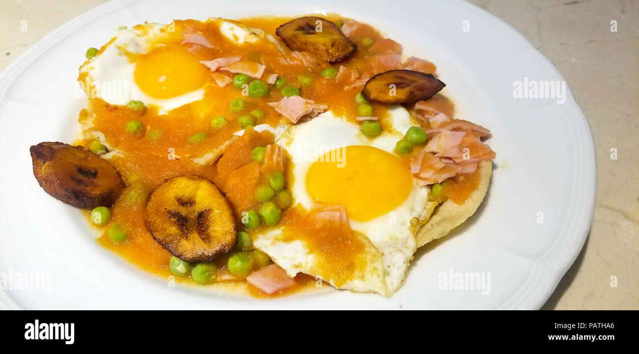 Huevos Motuleños or Eggs Motul style from yucatan mexico. breakfast Stock Photo