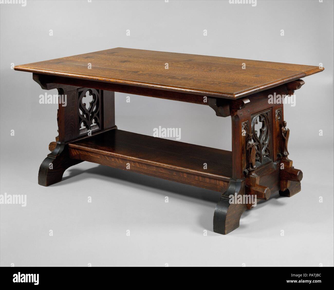 Library Table. Culture: American. Dimensions: 29 1/2 x 66 x 39 1/2 in. (74.9 x 167.6 x 100.3 cm). Maker: Rose Valley; William Lightfoot Price (1861-1916). Date: 1904.  Rose Valley, a utopian Arts and Crafts colony, was founded in 1901 near Moylan, Pennsylvania, by William Lightfoot Price, a Philadelphia architect, with a coterie of his politically liberal colleagues, clients, and friends. Inspired by the advocates of the British Arts and Crafts movement, John Ruskin and William Morris, the community was established for the 'manufacture of ... materials and products involving artistic handicraf Stock Photo