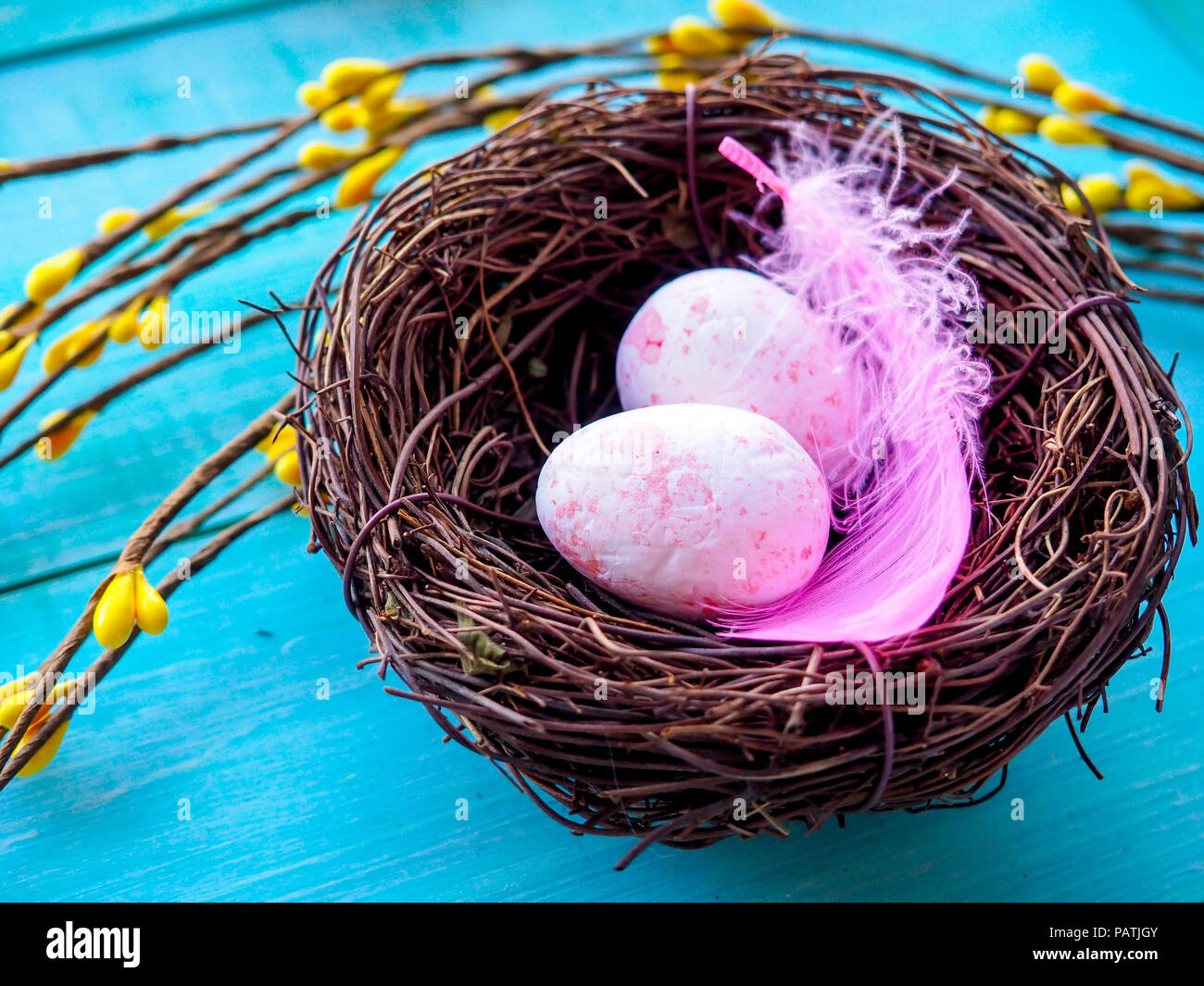 Easter decoration, Easter eggs twigs on wood Stock Photo