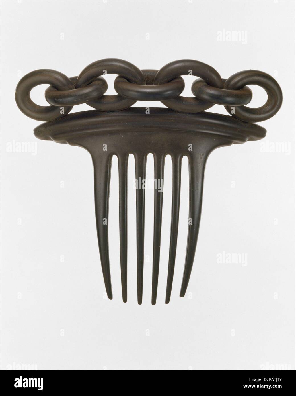Hair Comb. Dimensions: 4 1/4 x 4 1/2 in. (10.8 x 11.4 cm). Manufacturer ...