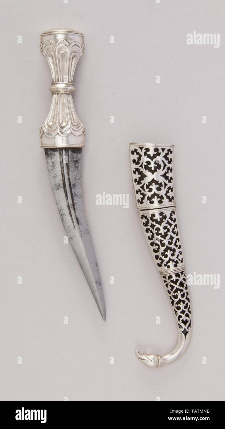 Dagger with Sheath. Culture: South Indian. Dimensions: H. with sheath 10 1/8 in. (25.7 cm); H. without sheath 8 5/8 in. (21.9 cm);  H. of blade 5 1/4 in. (13.3 cm); W. 1 5/16 in. (3.3 cm); Wt. 6.3 oz. (178.6 g); Wt. of sheath 3.4 oz. (96.4 g). Date: 18th-19th century. Museum: Metropolitan Museum of Art, New York, USA. Stock Photo