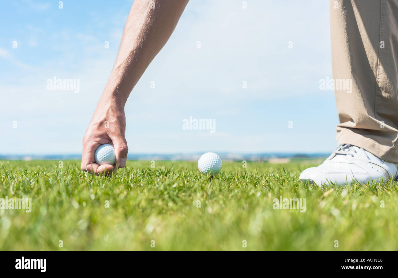 Close-up of the hand of a professional male player taking a ball Stock Photo