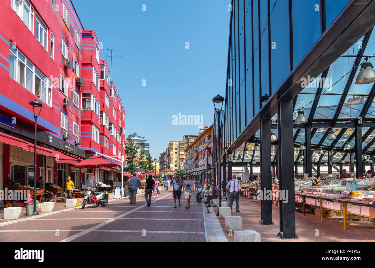 The newly refurbished Pazari i Ri, New bazaar area,  With its brightly coloured apartmrnt blocks and central market, in Tirana, Albania, Stock Photo