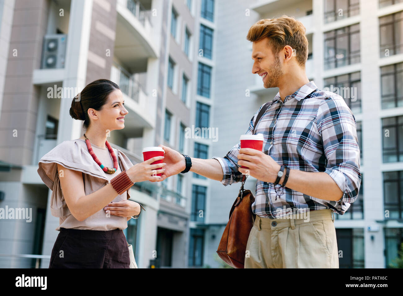 Nice happy colleagues having a coffee break Stock Photo