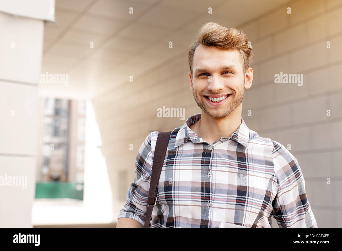 Portrait of a happy young man Stock Photo - Alamy