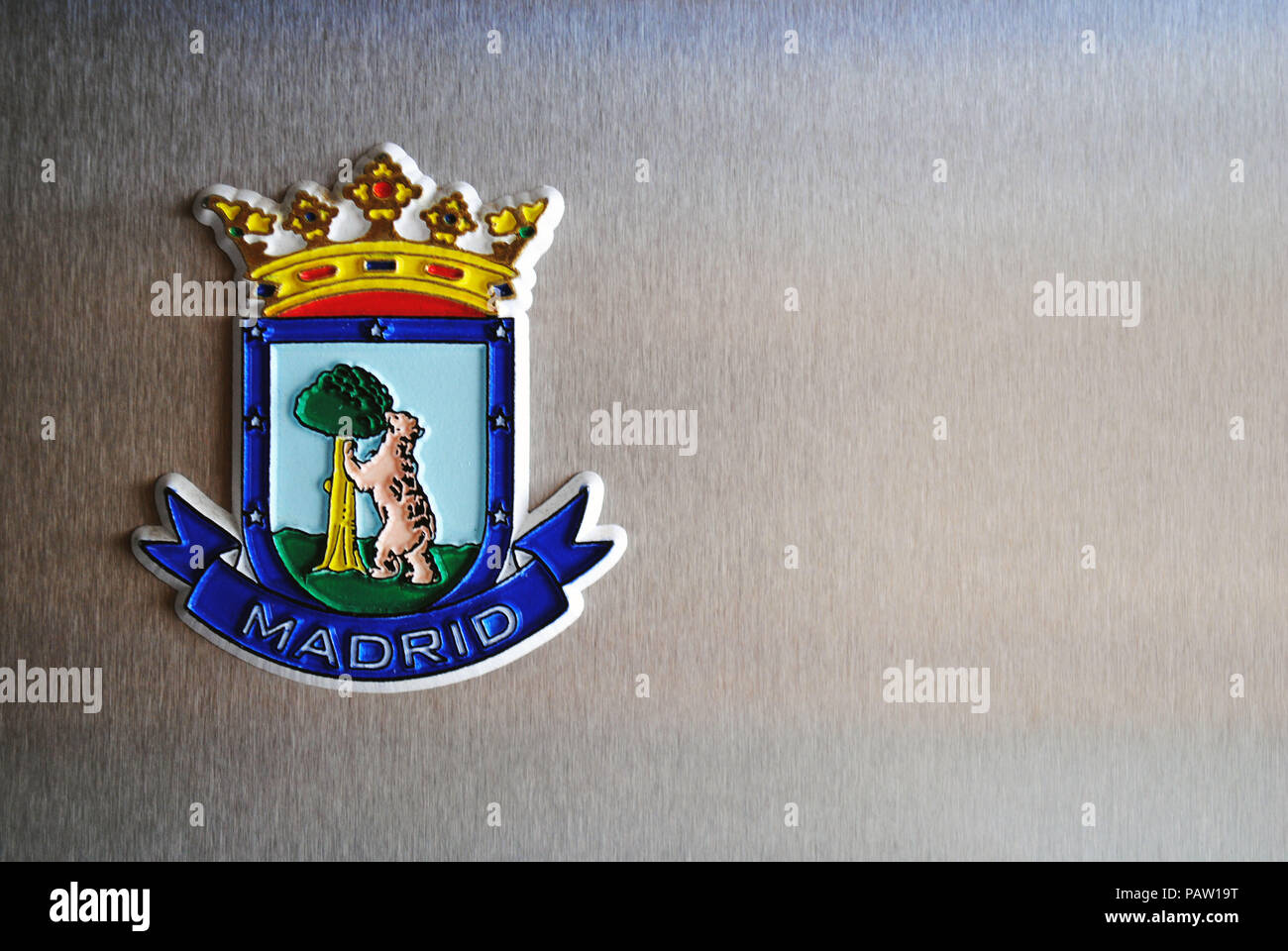 Madrid's coat of arms on a fridge magnet for tourists. Stock Photo