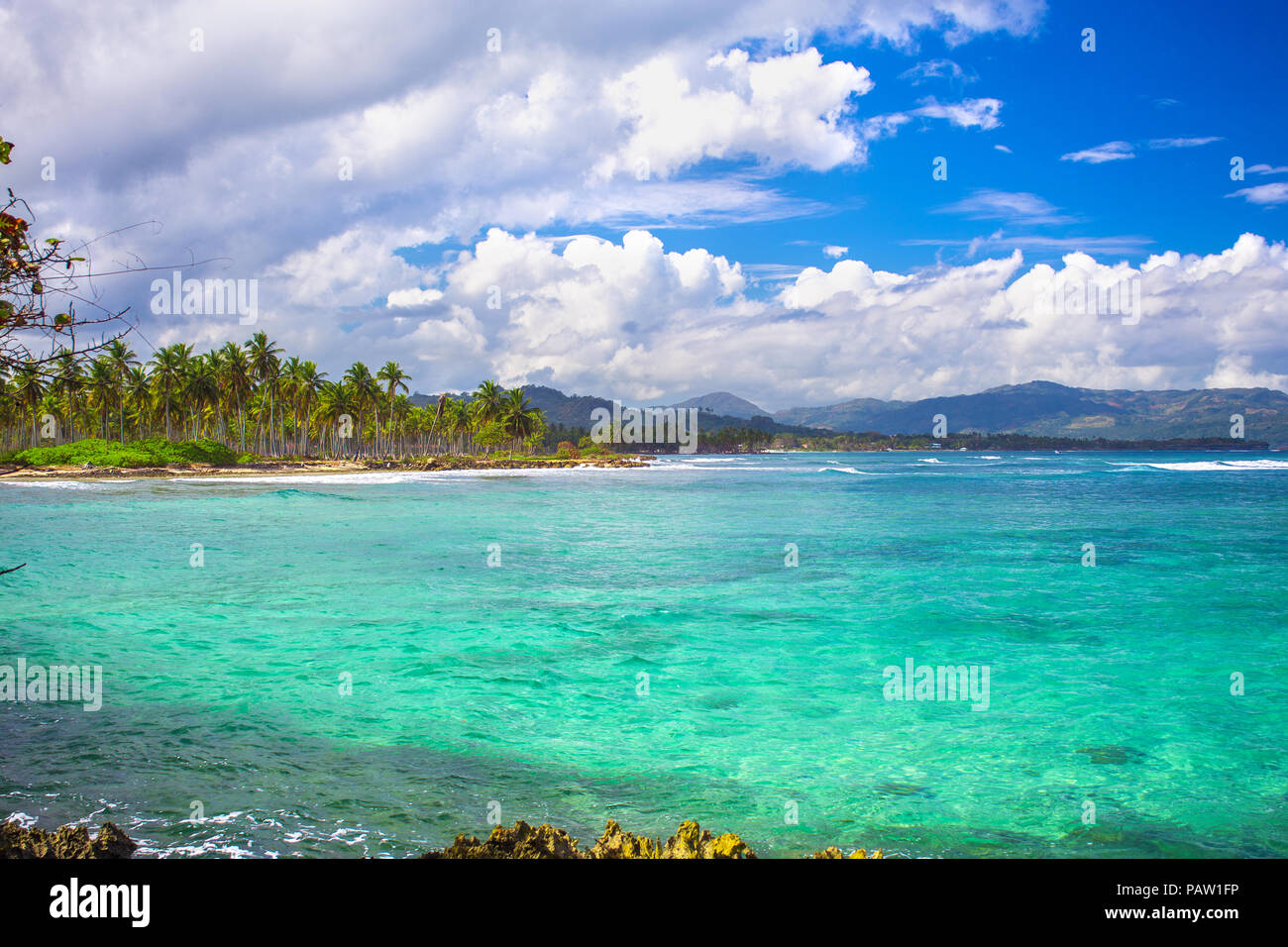 Caribbean sea surface summer wave background. Exotic water landscape with clouds on horizon. Dominican Republic nature relax. Travel tropical island r Stock Photo