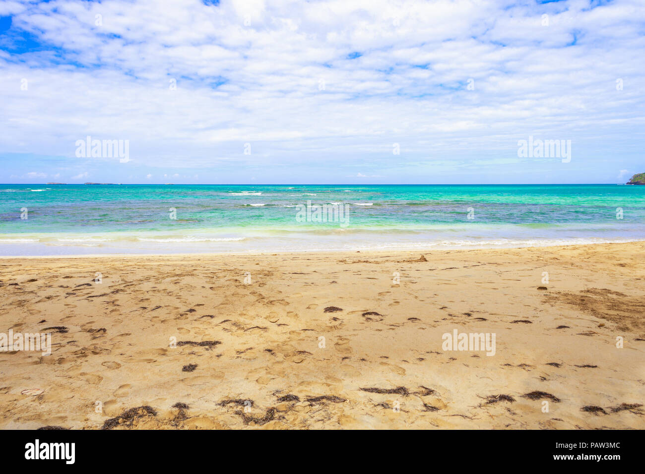 Empty sandy beach with azure blue color of the caribbean sea. Dominican Republic Stock Photo