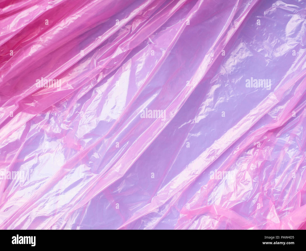 Pink purple pastel plastic bag film background Stock Photo - Alamy