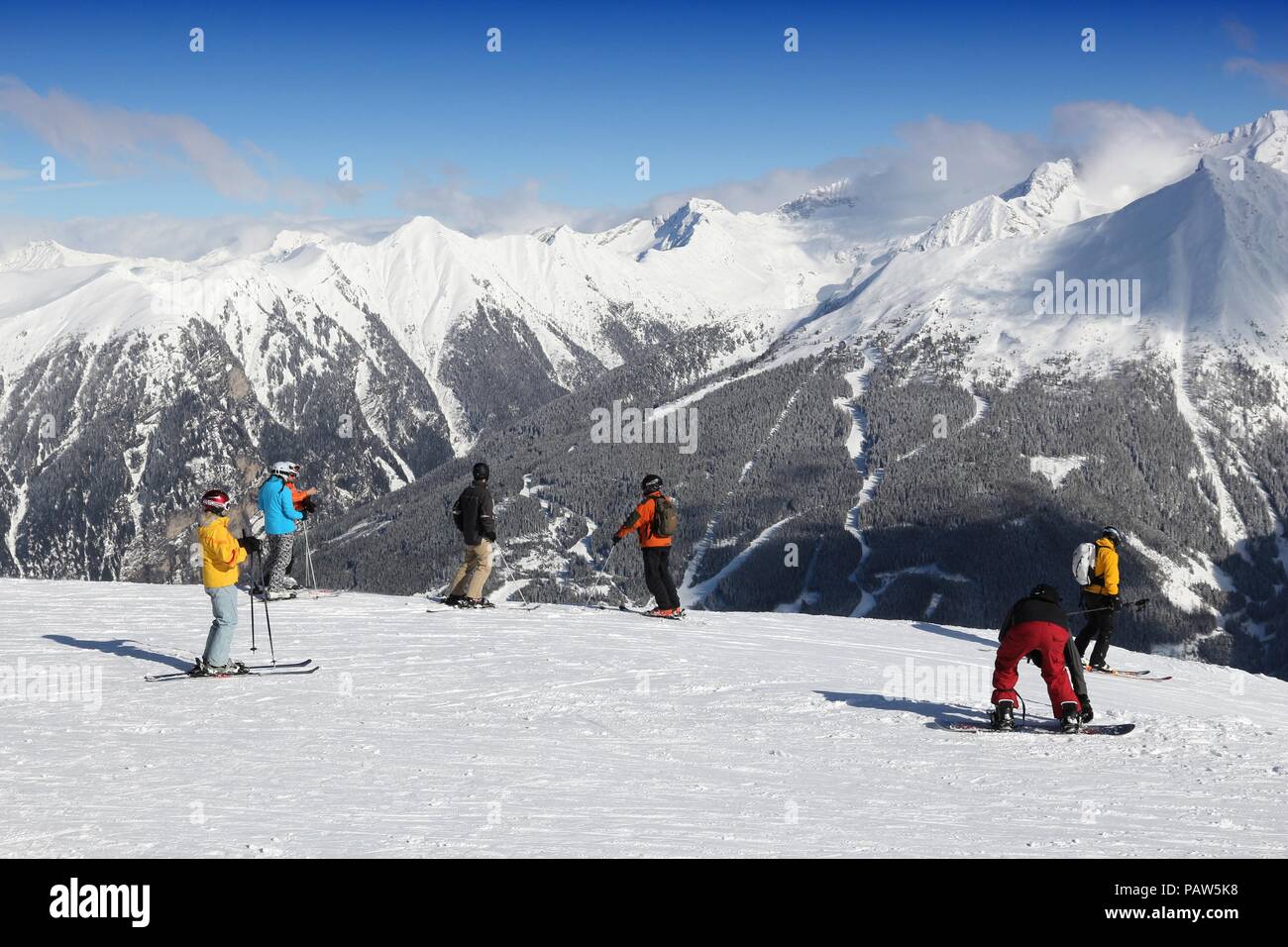 BAD GASTEIN, AUSTRIA - MARCH 9, 2016: People ski in Bad Gastein. It is part of Ski Amade, one of largest ski regions in Europe with 760km of ski runs. Stock Photo