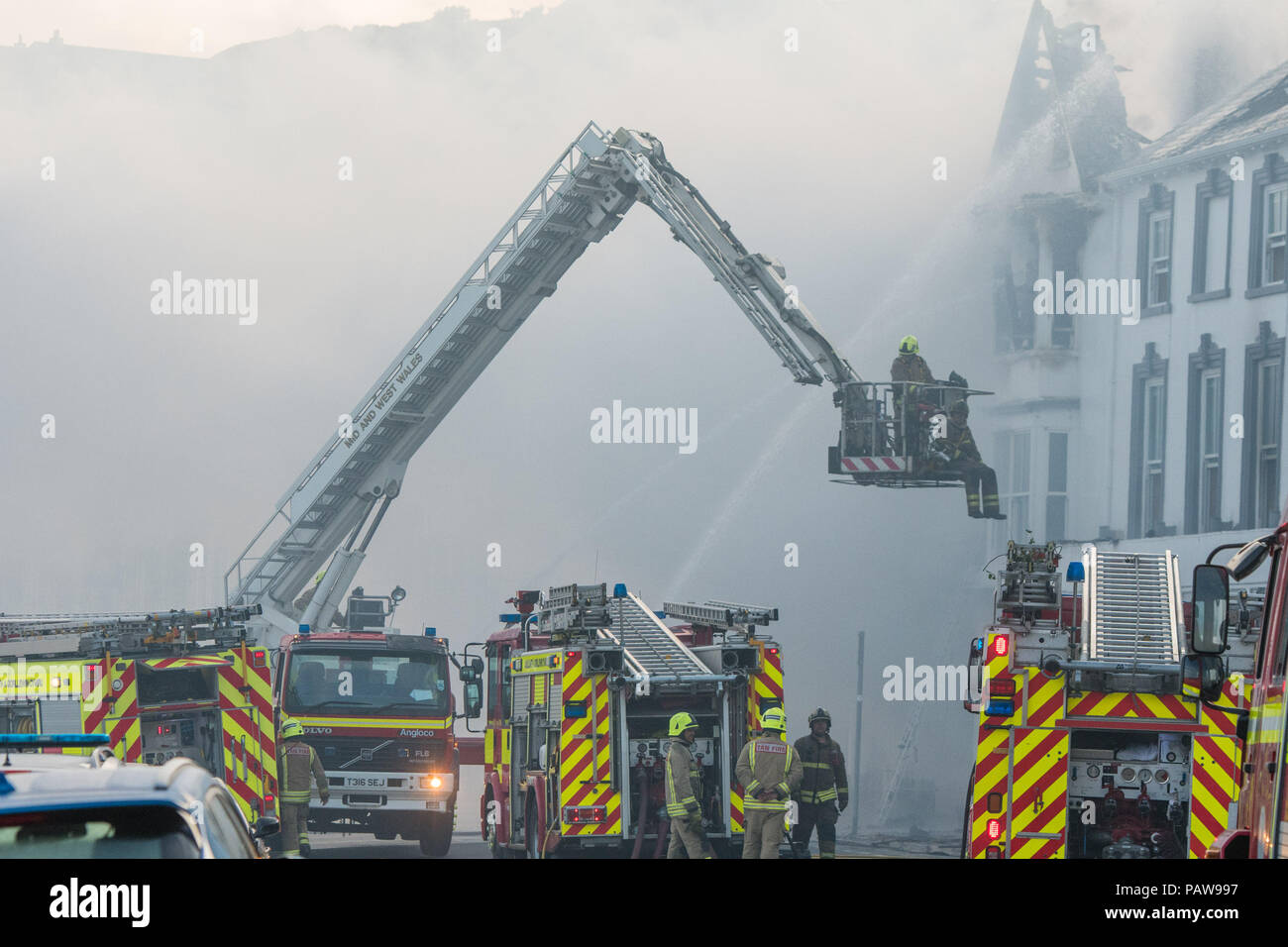 Firefighters fighting house fire from hires stock photography and