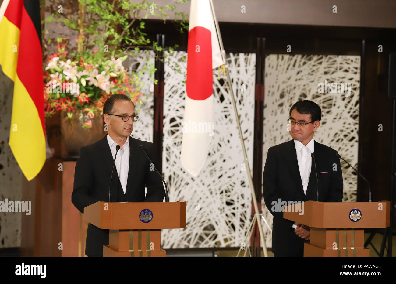 Tokyo, Japan. 25th July, 2018. Visiting German Foreign Minister Heiko Maas (L) and his Japanese counterpart Taro Kono give their statements after their meeting at the Iikura guesthouse in Tokyo on Wednesday, July 25, 2018. Maas is now in Tokyo on the first leg of his Asian tour. Credit: Yoshio Tsunoda/AFLO/Alamy Live News Stock Photo