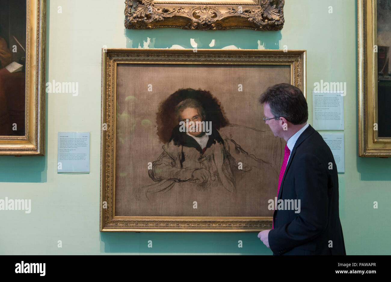 National Portrait Gallery, London, UK. 25 July, 2018. Jeremy Wright, Culture Secretary views Sir Thomas Lawrence’s famous portrait of William Wilberforce, which will travel to Hull, the place of his birth, for the first time as part of ‘Coming Home’. Lawrence’s unfinished portrait of Wilberforce, was one of the first works acquired by the National Portrait Gallery when it was established in 1856. The work will go on display in the Ferens Art Gallery in Hull in 2019. Credit: Malcolm Park/Alamy Live News. Stock Photo