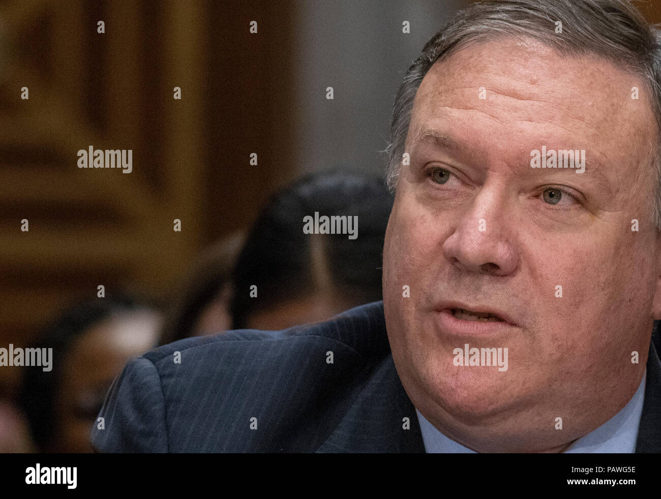 United States Secretary of State Mike Pompeo testifies before the US Senate Committee on Foreign Relations on 'An update on American Diplomacy to Advance our National Security Strategy' on Capitol Hill in Washington, DC on Wednesday, July 25, 2018. Pompeo took questions on the Helsinki Summit with President Putin of Russia and progress on the denuclearization of North Korea. Credit: Ron Sachs/CNP | usage worldwide Stock Photo