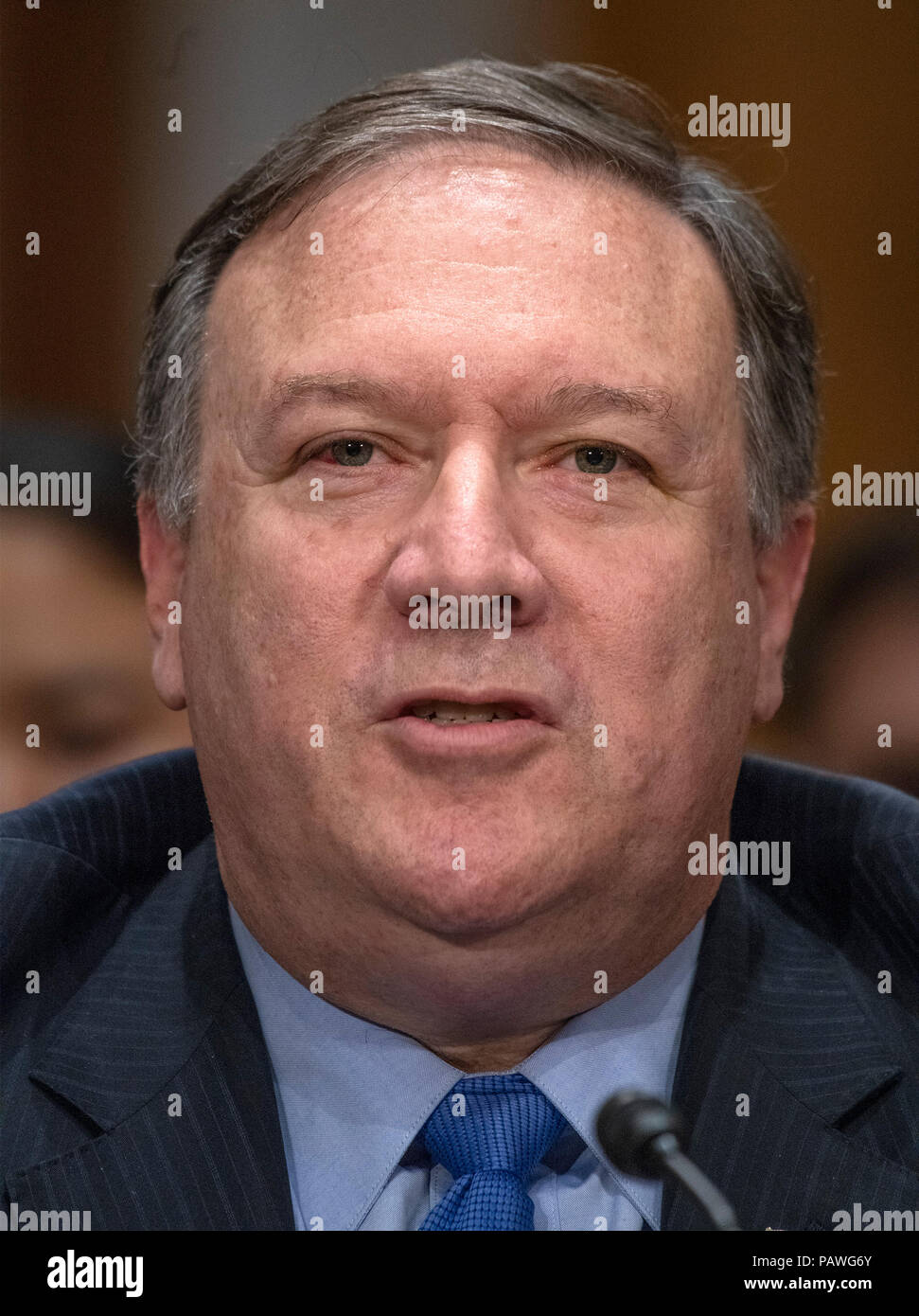 United States Secretary of State Mike Pompeo testifies before the US Senate Committee on Foreign Relations on 'An update on American Diplomacy to Advance our National Security Strategy' on Capitol Hill in Washington, DC on Wednesday, July 25, 2018. Pompeo took questions on the Helsinki Summit with President Putin of Russia and progress on the denuclearization of North Korea. Credit: Ron Sachs/CNP | usage worldwide Stock Photo