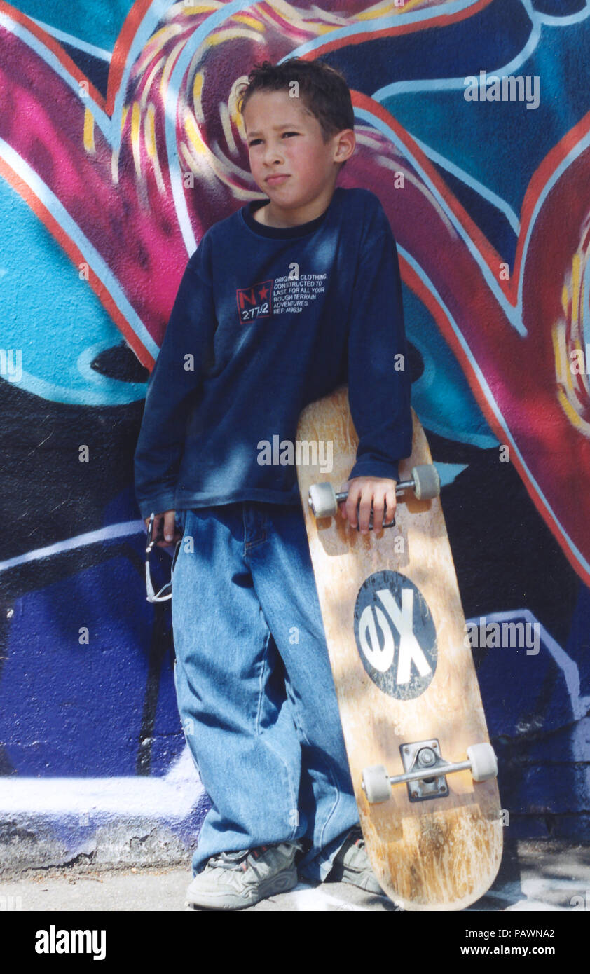 young skateboarder urban graffiti Stock Photo