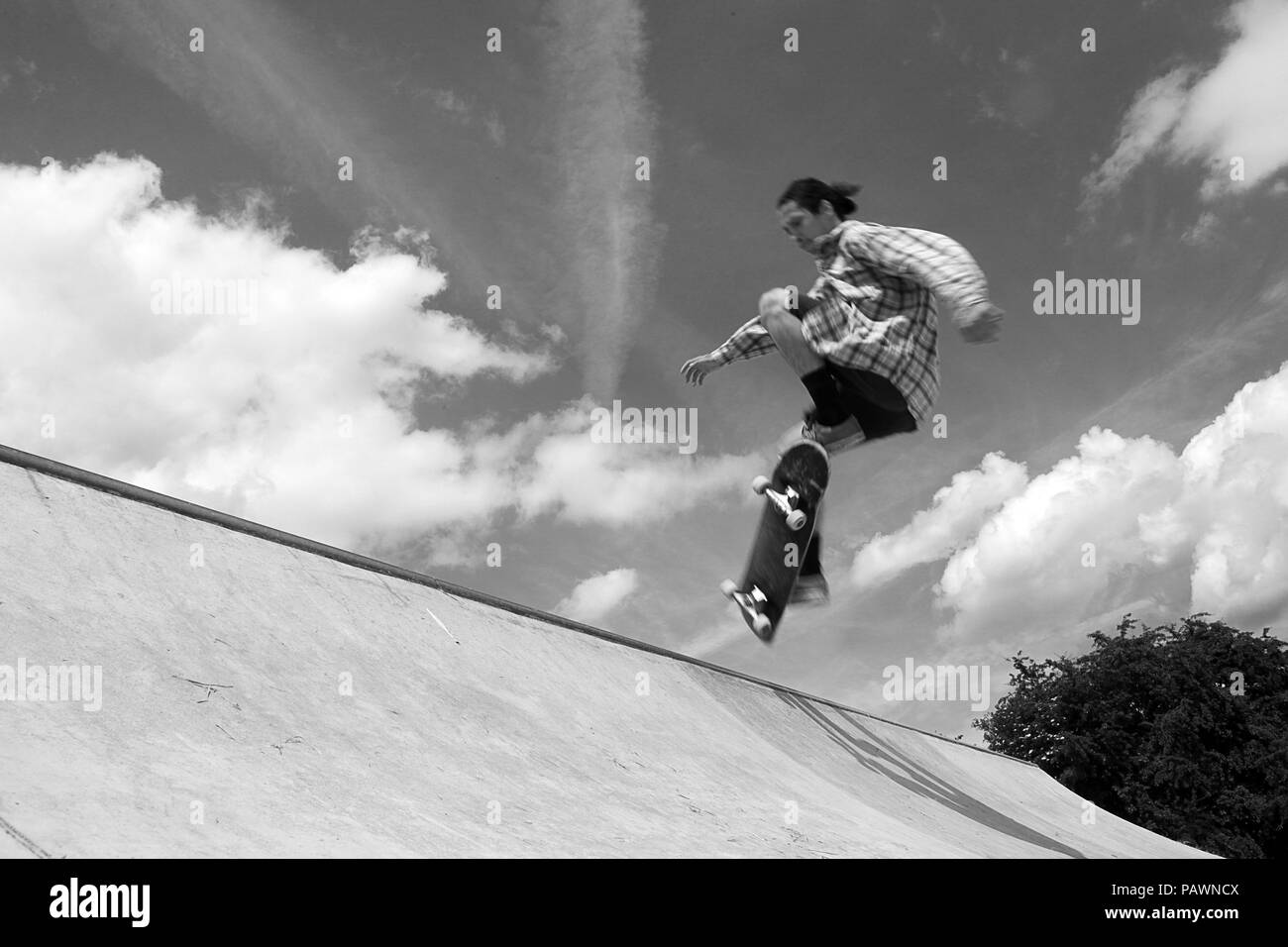 Skateboarding at a skatepark Stock Photo