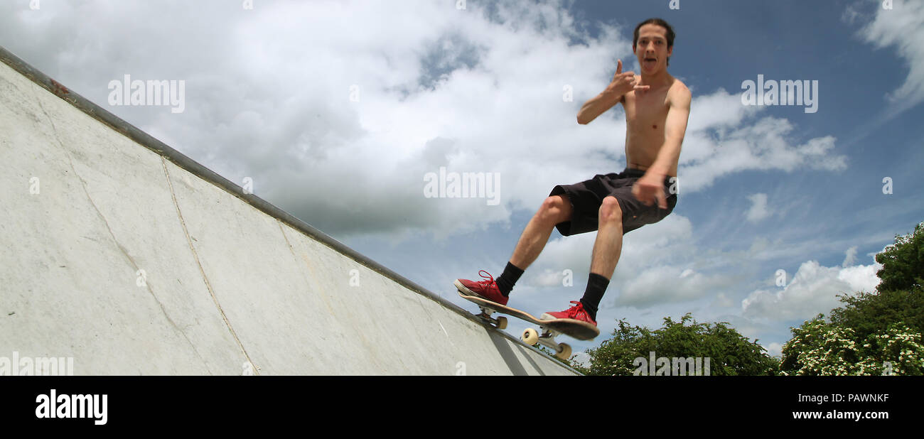 Skateboarding at a skatepark Stock Photo