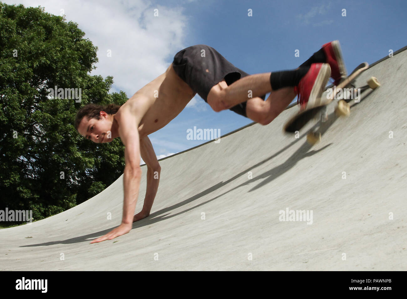 Skateboarding at a skatepark Stock Photo