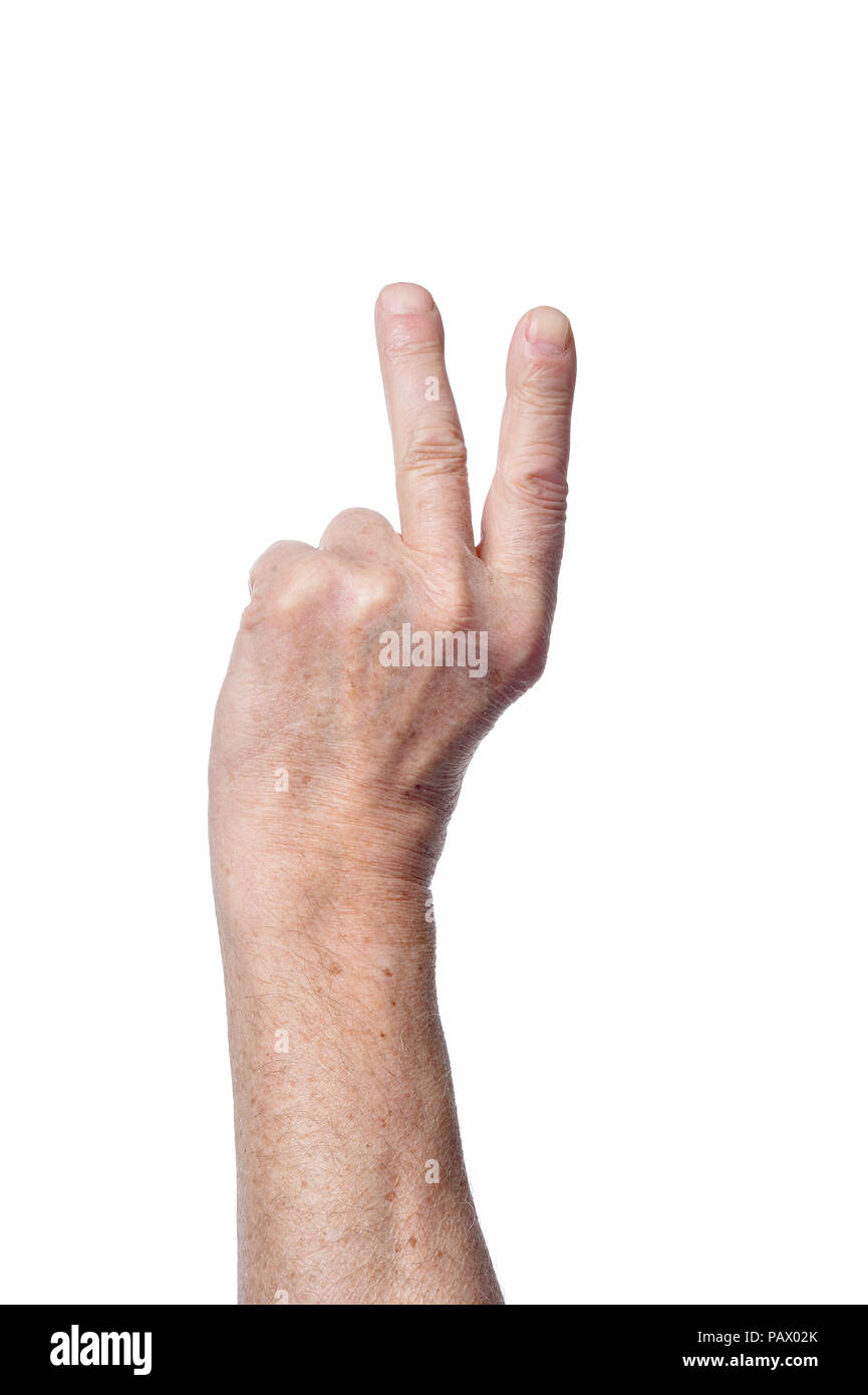 Hand of senior woman showing two fingers Stock Photo