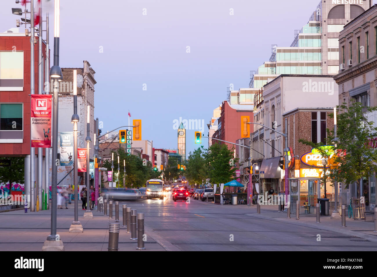 King Street West at dusk in downtown Kitchener, Ontario, Canada. Stock Photo