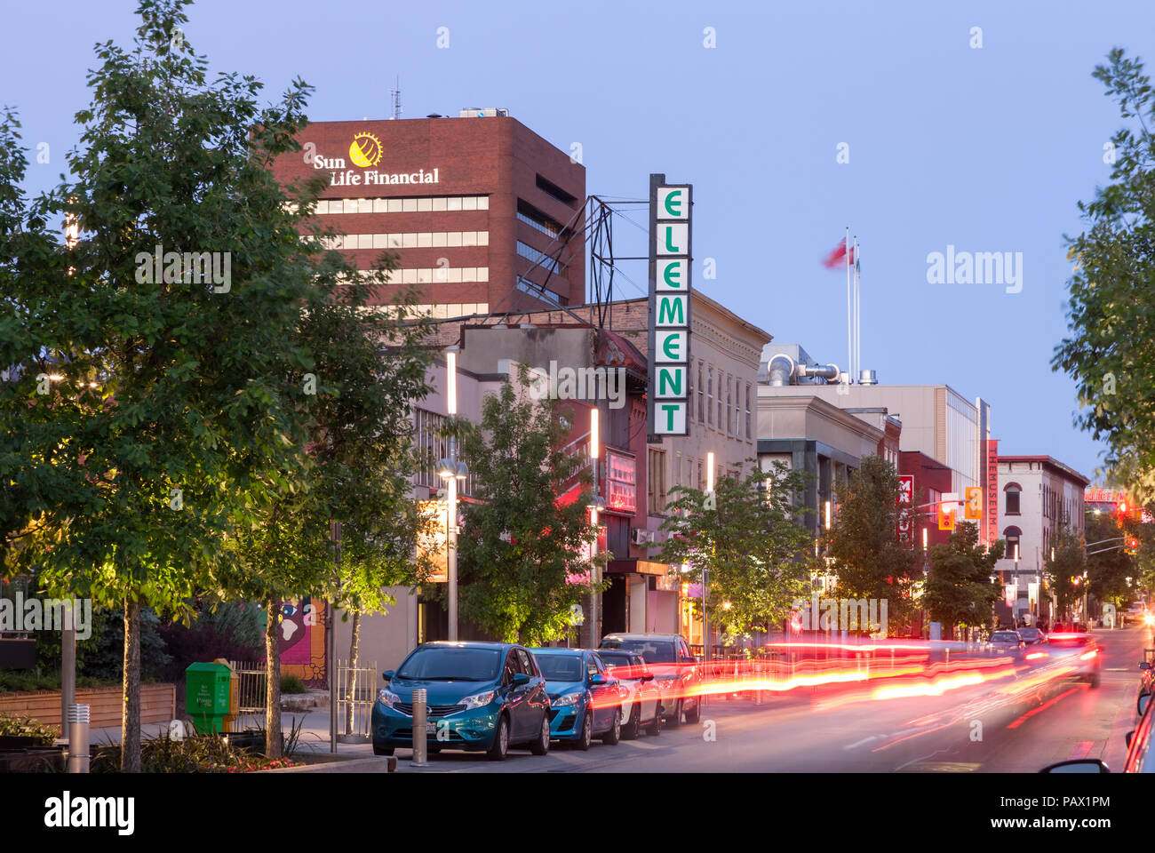 King Street West at dusk in downtown Kitchener, Ontario, Canada. Stock Photo