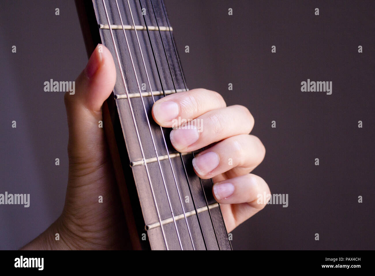 Part of musical instrument with strings. Spanish guitar Stock Photo - Alamy