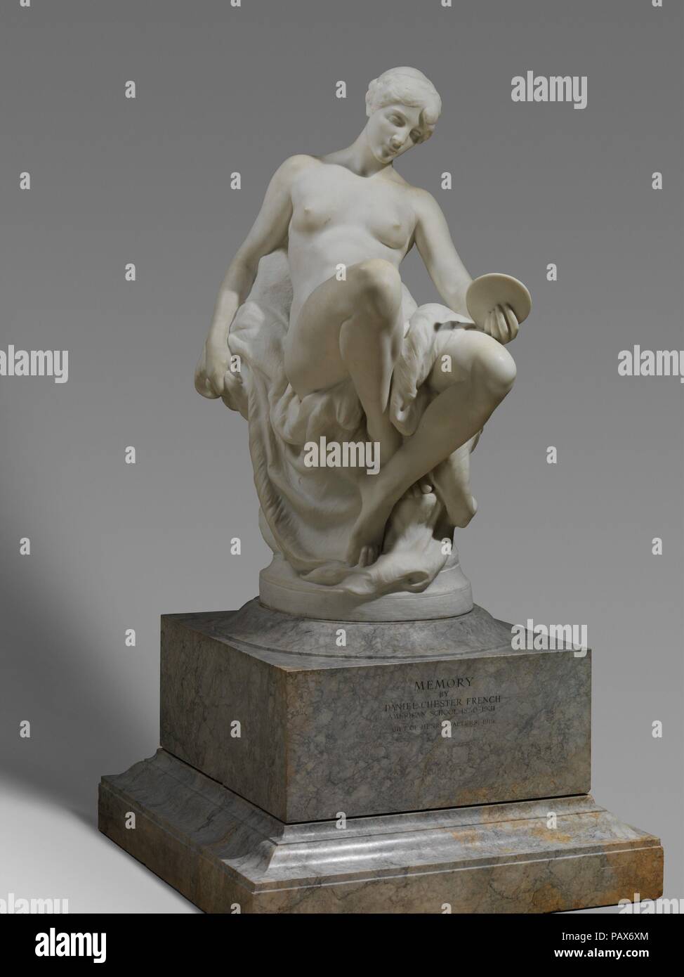 Memory. Artist: Daniel Chester French (American, Exeter, New Hampshire 1850-1931 Stockbridge, Massachusetts). Dimensions: 57 1/2 x 25 x 42 1/2 in. (146.1 x 63.5 x 108 cm). Date: 1886-87, revised 1909; carved 1917-19.  For nearly fifty years, French included the allegorical female form in both his private and his public commissions. His involvement with Memory spanned over three decades, from his initial clay sketch of 1886 to the exhibition of this enlarged marble in 1919. The sculptor focused on conveying life's transience through symbolism: the motif of the mirror as well as the work's title Stock Photo