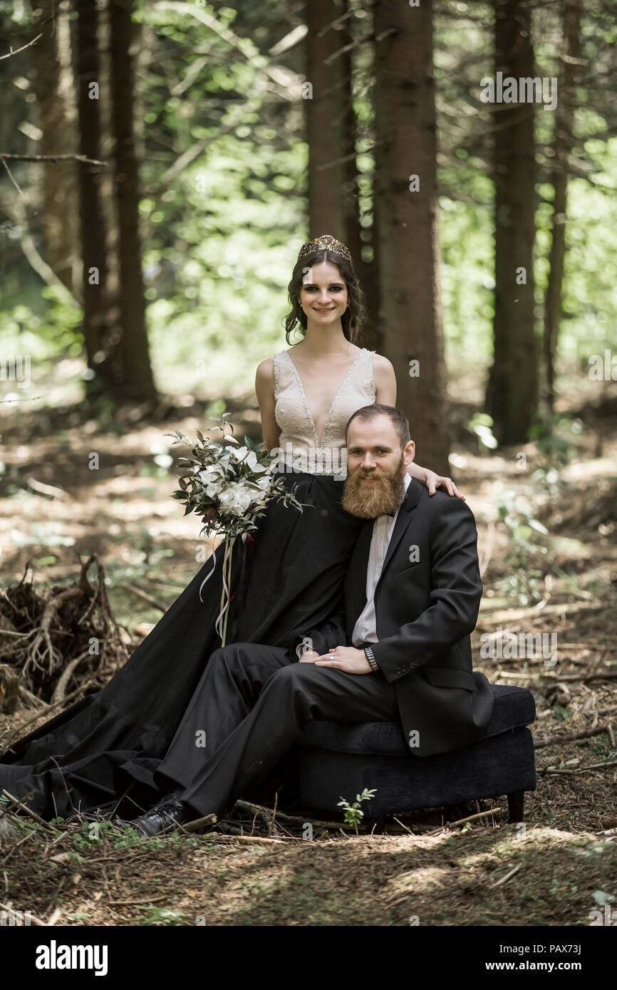 portrait of the bride and groom on the background of the Park Stock Photo
