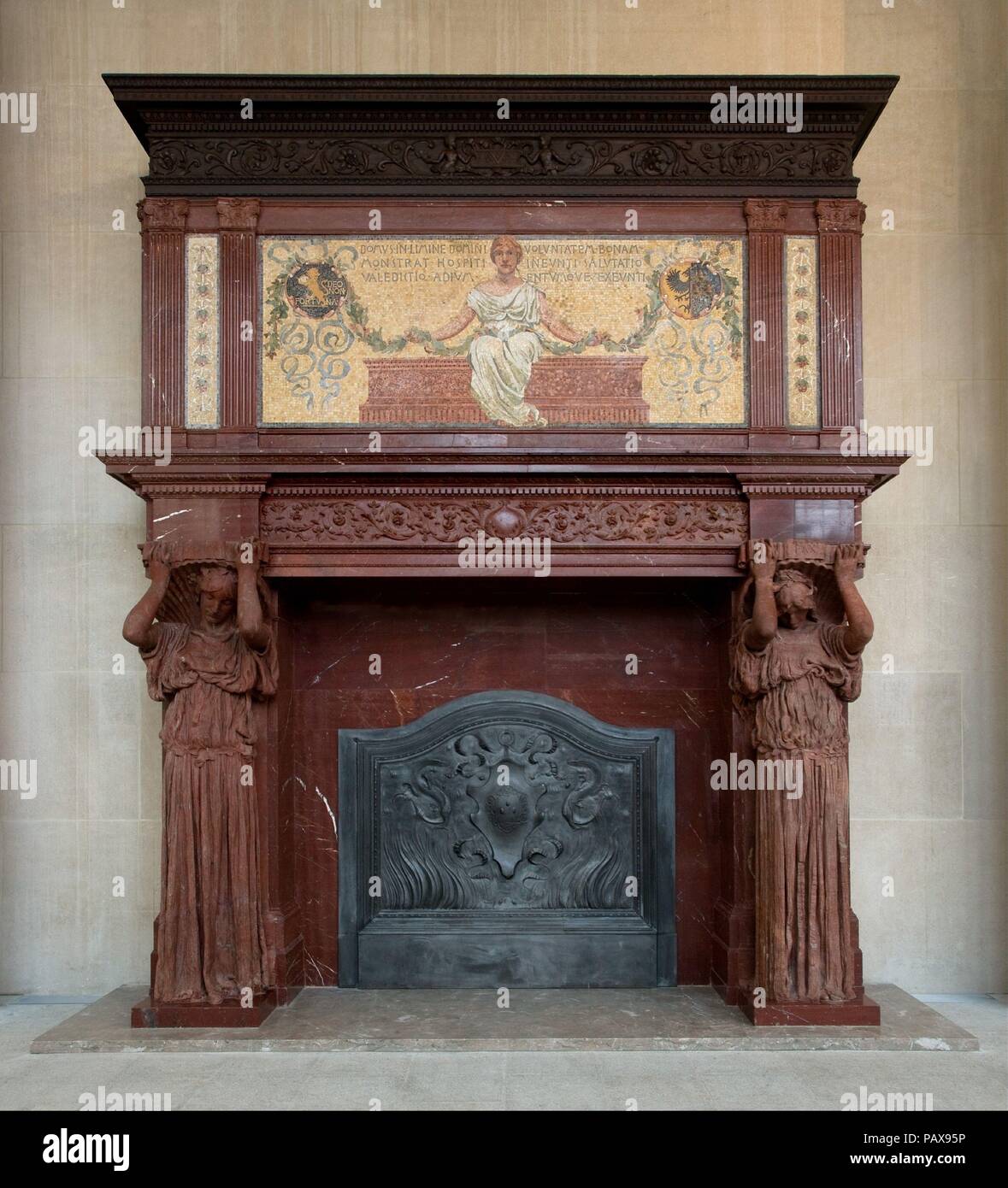 Vanderbilt Mantelpiece. Culture: American. Dimensions: 184 3/8 x 154 7/8 x 37 1/4 in. (468.3 x 393.4 x 94.6 cm). Maker: Augustus Saint-Gaudens (American, Dublin 1848-1907 Cornish, New Hampshire). Date: ca. 1881-83.  This mantelpiece originally dominated the entrance hall of the residence of Cornelius Vanderbilt II on Fifth Avenue at 57th Street (demolished 1925-27). Working for the architect George B. Post, the artist John La Farge (1835-1910) created a lavish decorative program, to which Saint-Gaudens contributed many of the sculptural elements. Two classical caryatids, Amor (Love) and Pax (P Stock Photo