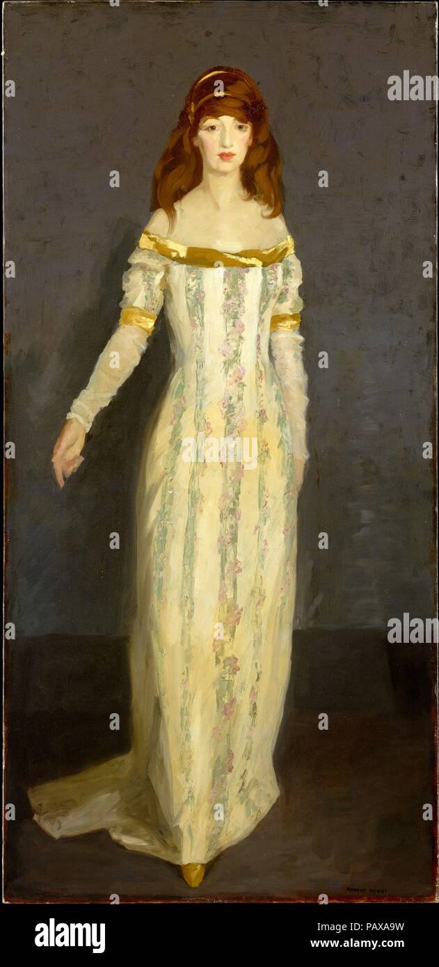 The Masquerade Dress. Artist: Robert Henri (American, Cincinnati, Ohio 1865-1929 New York). Dimensions: 76 1/2 x 36 1/4 in. (194.3 x 92.1 cm). Date: 1911.  Robert Henri was one of the most influential artists and teachers in twentieth-century American art.  Among his students and disciples were many artists who came to maturity between 1910 and 1930, including George Bellows, Rockwell Kent, Eugene Speicher, Patrick Henry Bruce, Glenn Coleman, Morgan Russell, Stuart Davis, and John Sloan.  <p>  Henri's approach to realism was influenced by his studies at the Pennsylvania Academy of the Fine Art Stock Photo