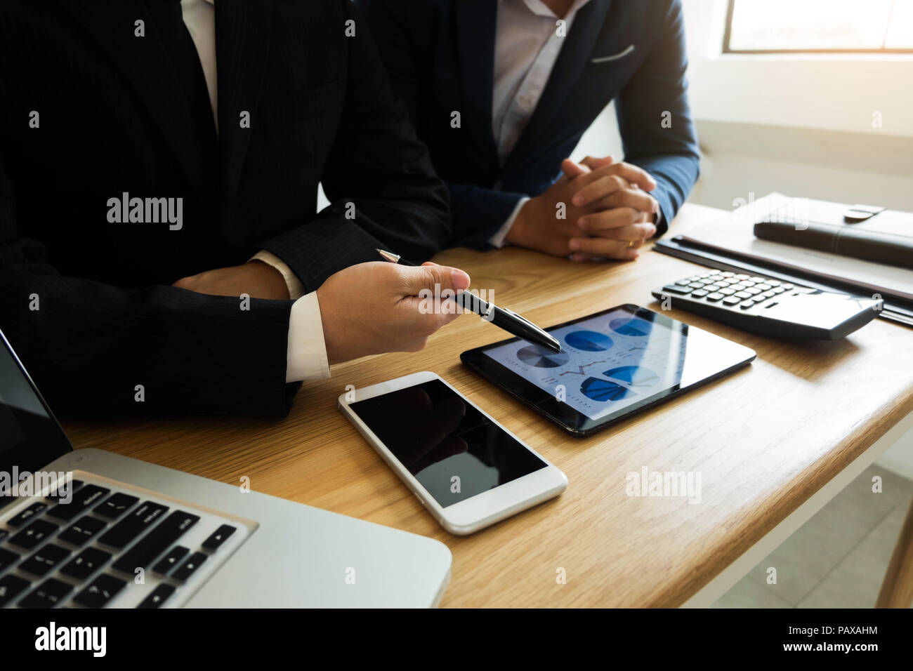 Businessmen present business plans and marketing to the partner .Business concept. Stock Photo