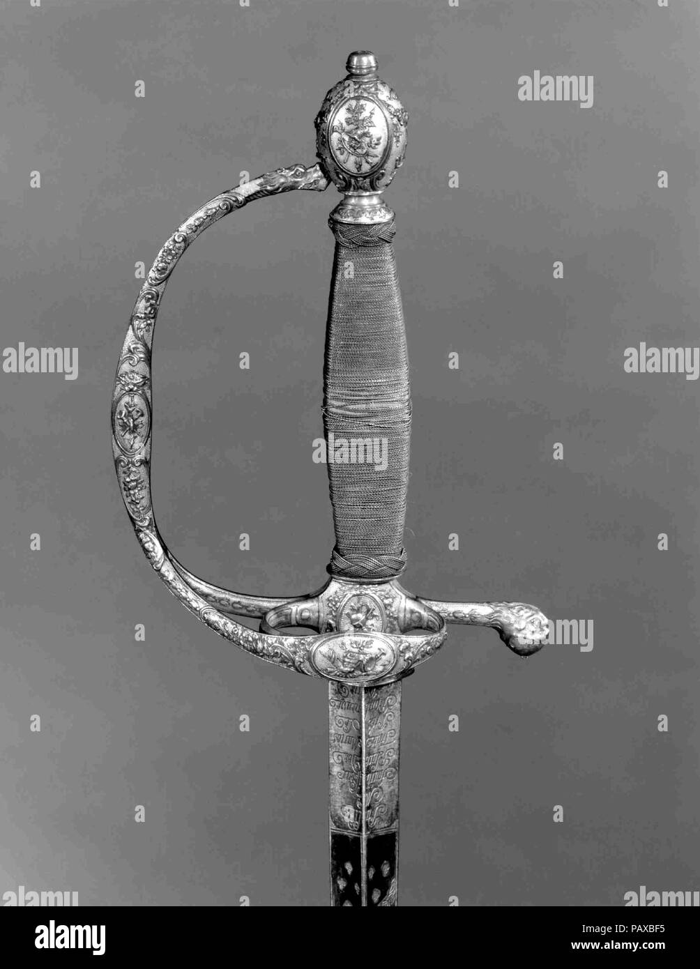 Smallsword with Scabbard. Culture: French, Paris. Dimensions: L. with scabbard 38 3/4 in. (98.4 cm); L. without scabbard 37 13/16 in. (96 cm); L. of blade 31 3/8 in. (79.7 cm); W. 4 5/16 in. (11 cm); D. 1 3/4 in. (4.5 cm); Wt. 12 oz. (340 g); Wt. of scabbard 2 oz. (56.7 g). Date: ca. 1785. Museum: Metropolitan Museum of Art, New York, USA. Stock Photo
