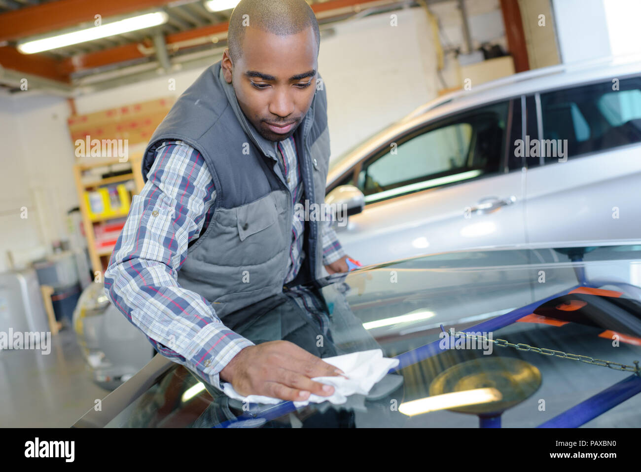Automotive glass installer hires stock photography and images Alamy